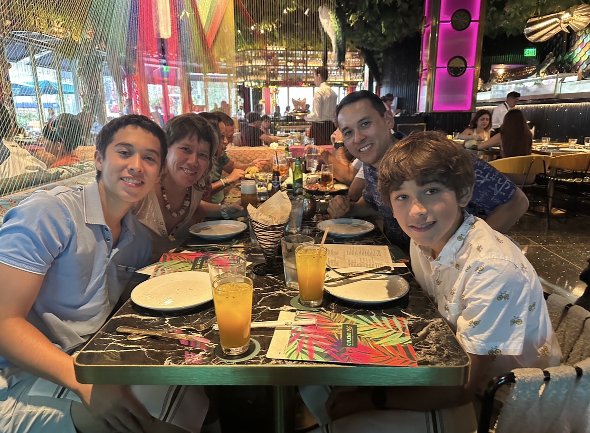 The family around a restaurant table