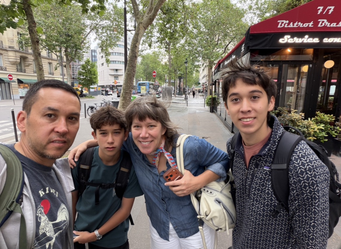 The family on a street corner in Paris